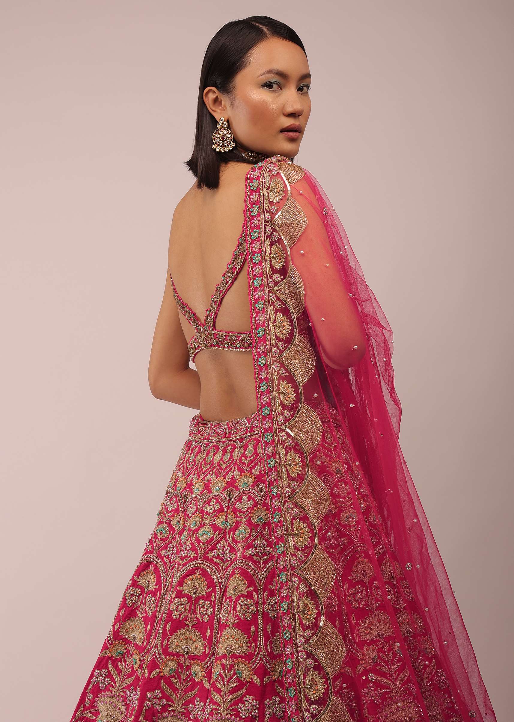 Rani Pink Lehenga In Golden Zari Work Embroidery Inspired By Mughal Architecture With Matching Net Dupatta In Embroidered Buttis - Image 4