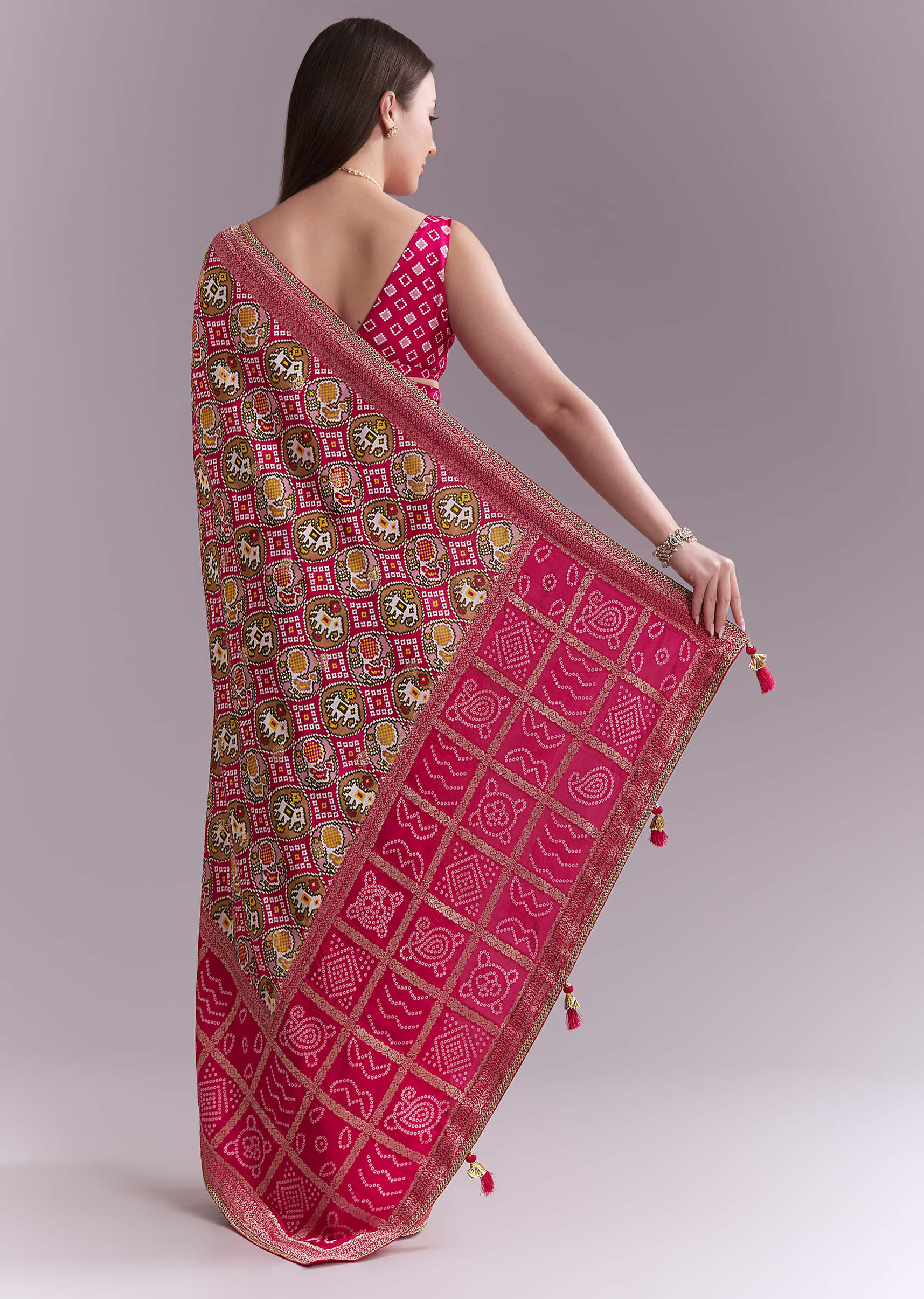 Rani Pink Silk Saree With Bandhani Work And Elephant Motifs - Image 4