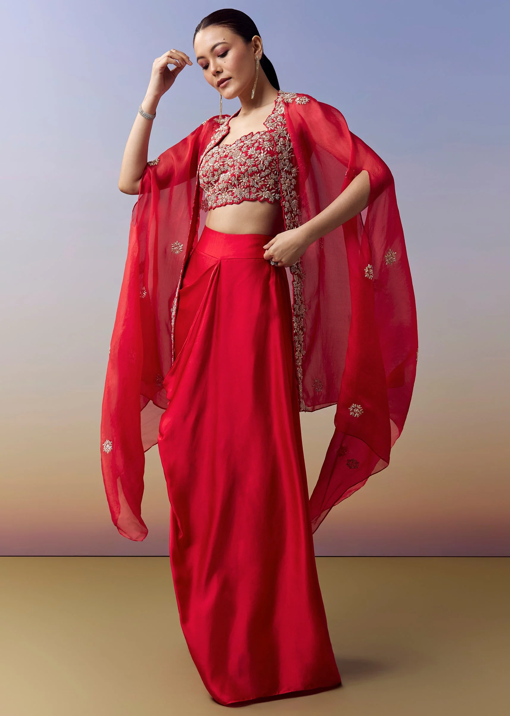 Red Contemporary Crop Top Skirt Set With Zardosi Work And Organza Cape