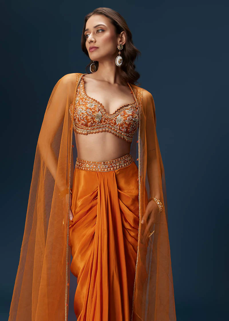 Rust Dhoti Skirt Set With Embellished Blouse And Tassel Net Dupatta - Image 4