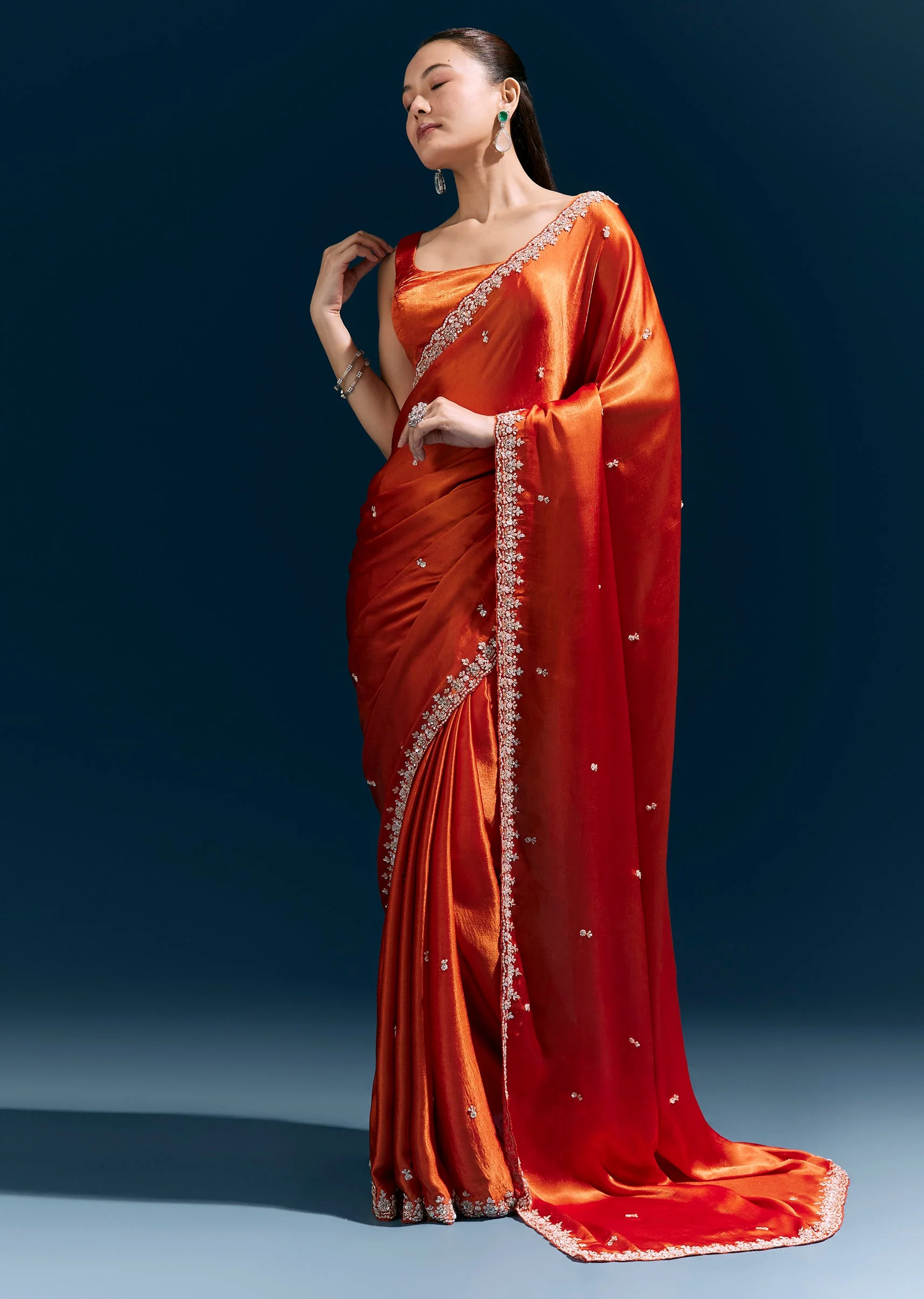 Rust Orange Satin Chinon Saree With Hand Embroidered Border And Sparkling Buttis