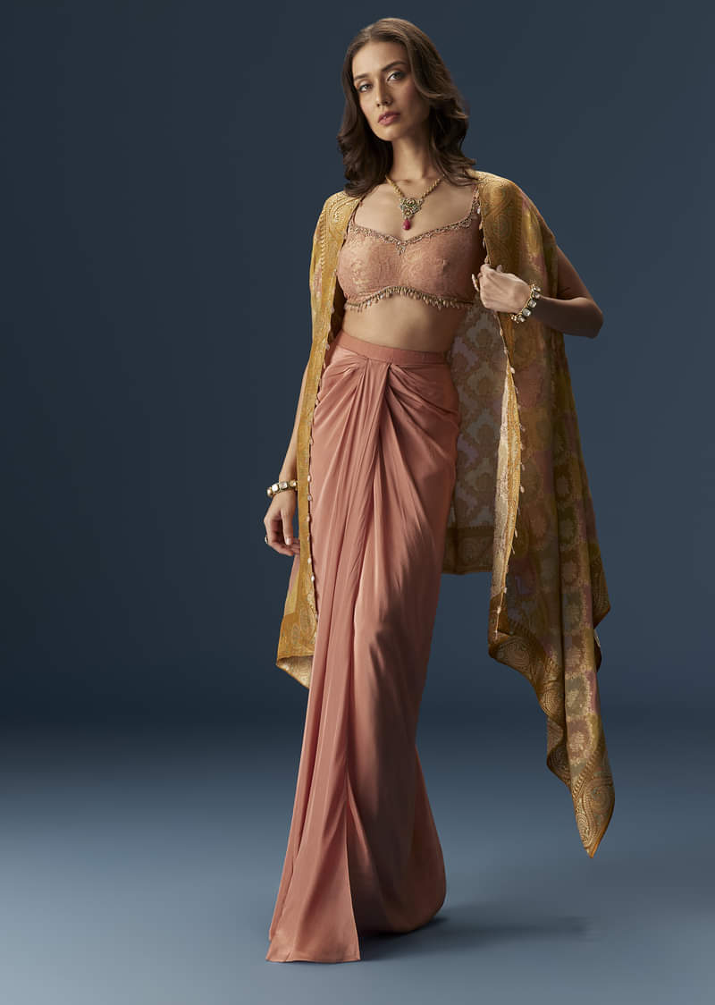 Rusty Pink Embroidered Blouse And Draped Skirt Set With Embellished Cape