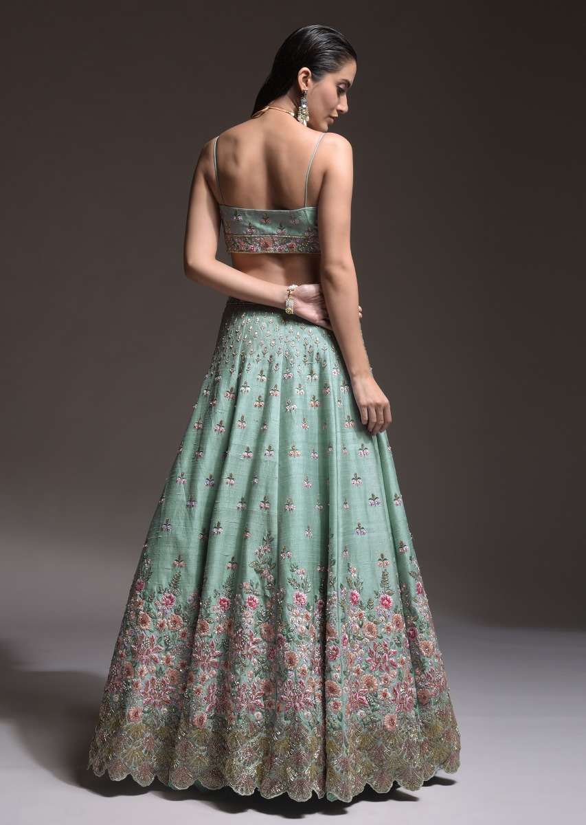 Sage Green Lehenga Choli In Raw Silk With Vibrant Resham Embroidered Cluster Of Summer Blooms And Buttis - Image 9