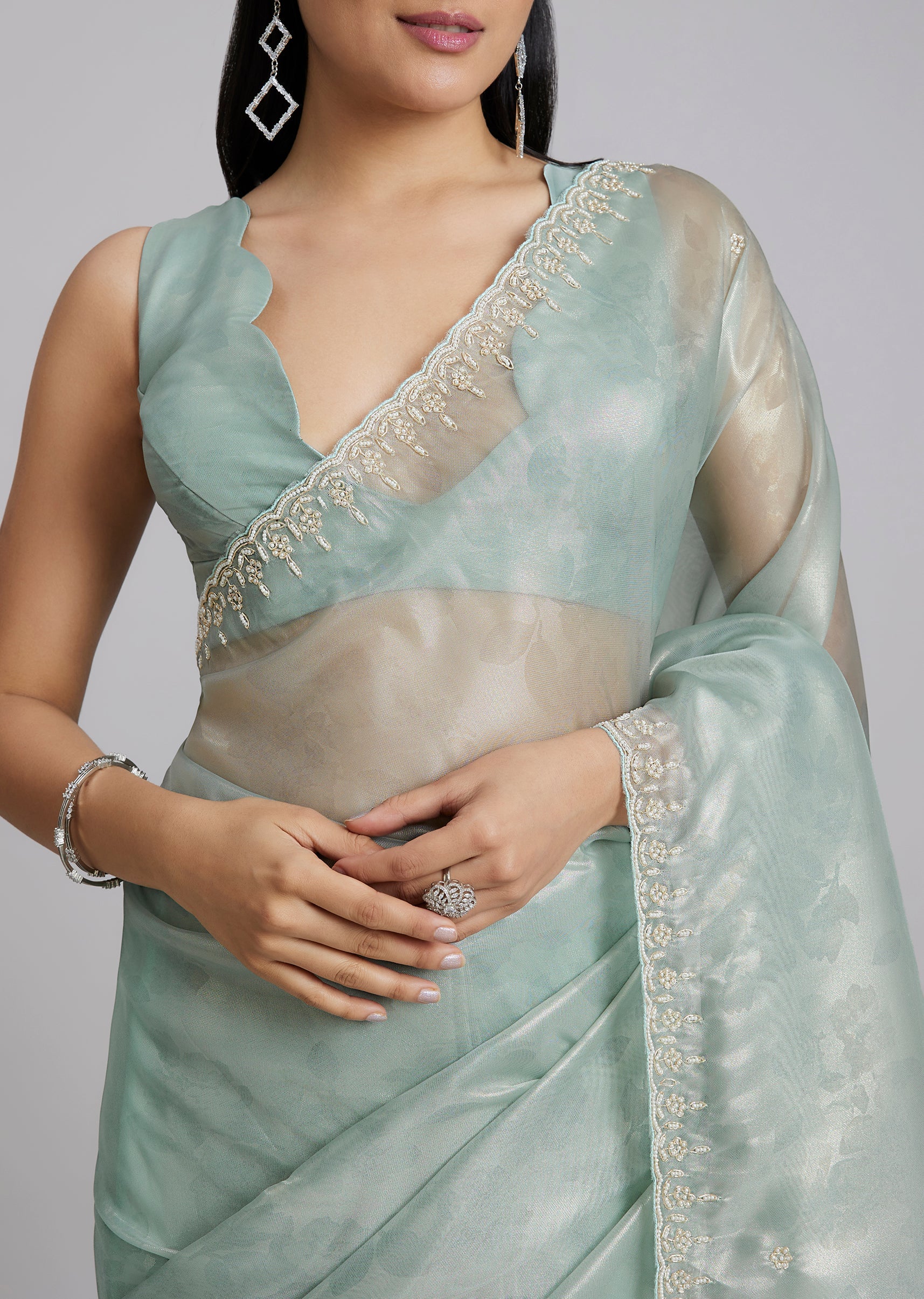 Sky Blue Tissue Saree With Floral Border And Buttis - Image 2