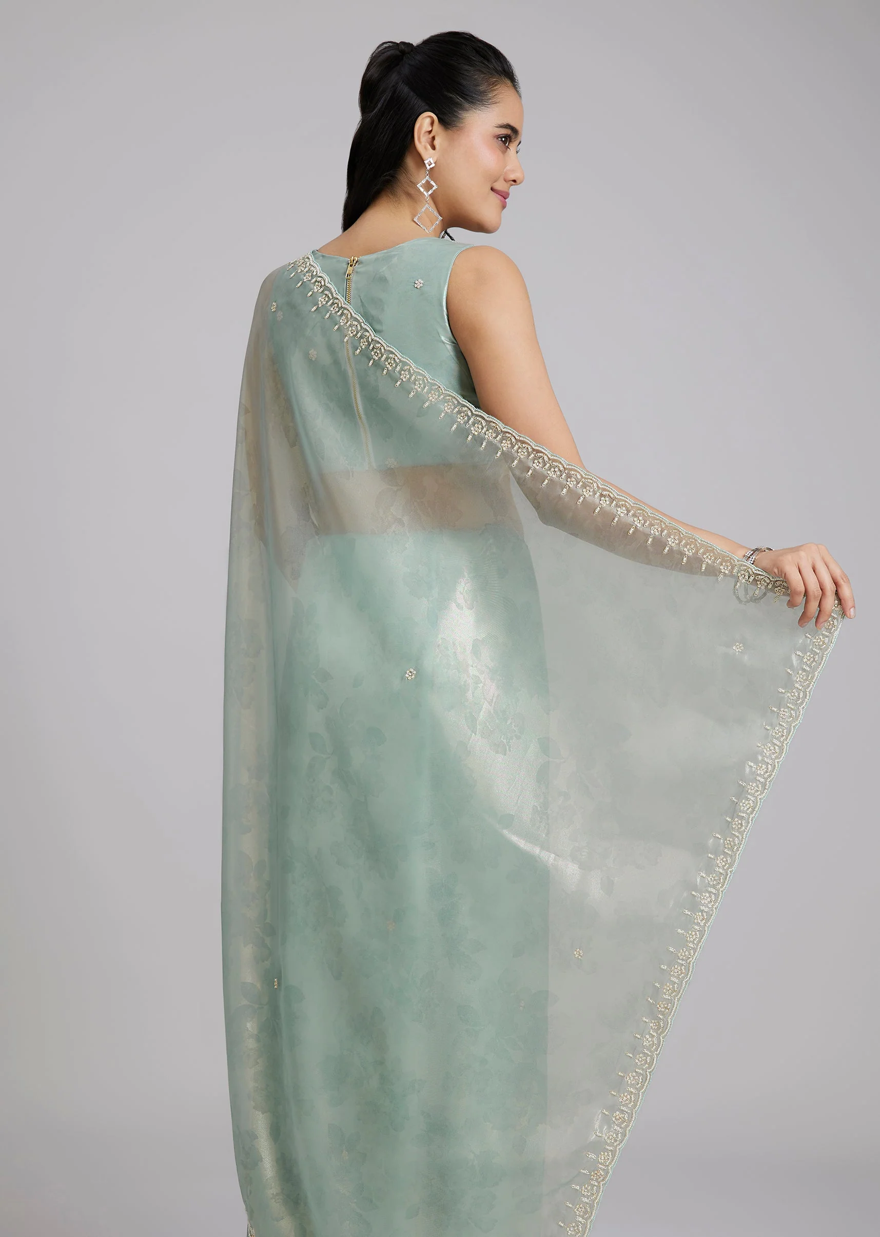 Sky Blue Tissue Saree With Floral Border And Buttis - Image 6