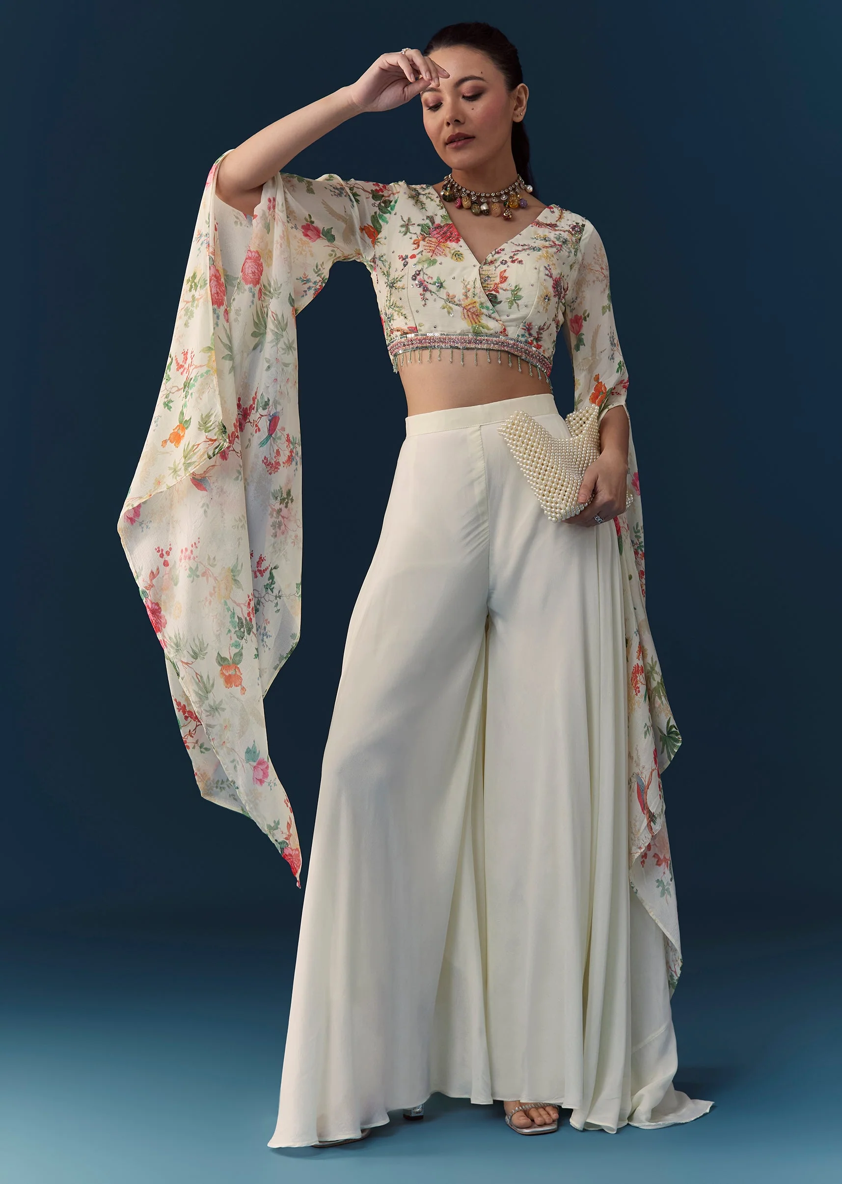 Soft Coordinated Couple Set – Off-White Floral Crop Top Palazzo Set With Cutdana For Her And Off-White Indo-Western Set With Hand Embroidery For Him - Image 3