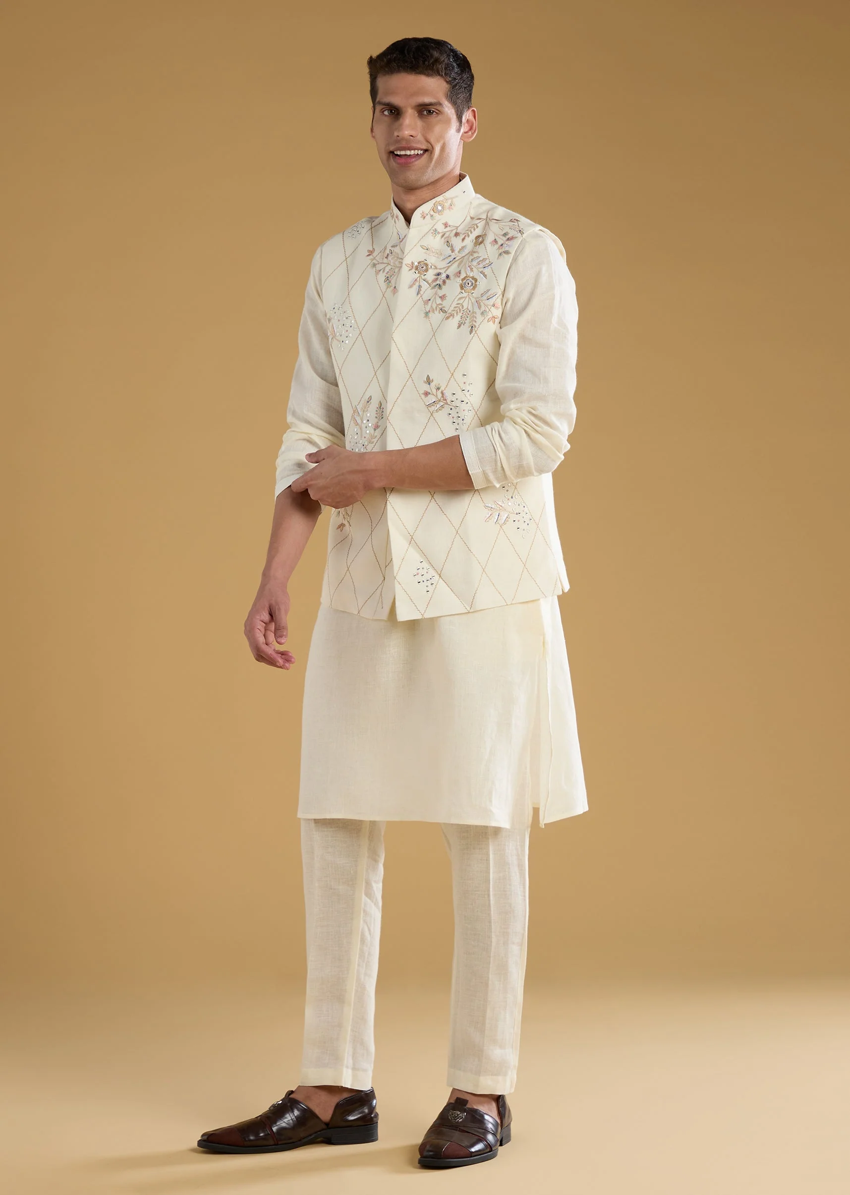 Soft Glow Couple Set – Off-White Heavy Embroidered Net Saree For Her And Cream Art Silk Jacket Kurta Set For Him - Image 10