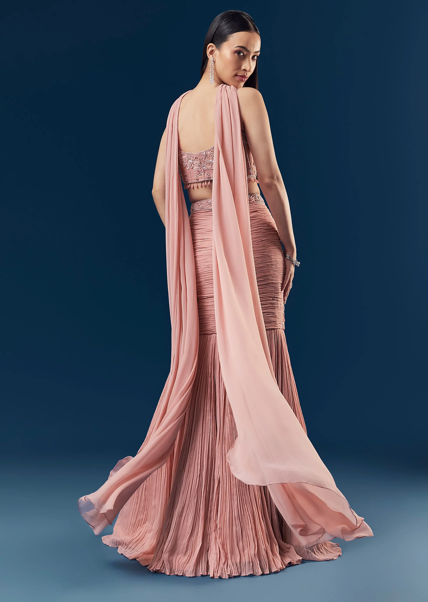 Velvet And Pastel Glamour Couple Set – Blush Pink Fish Cut Lehenga for Her And Blue Velvet Jodhpuri Set for Him - Image 4