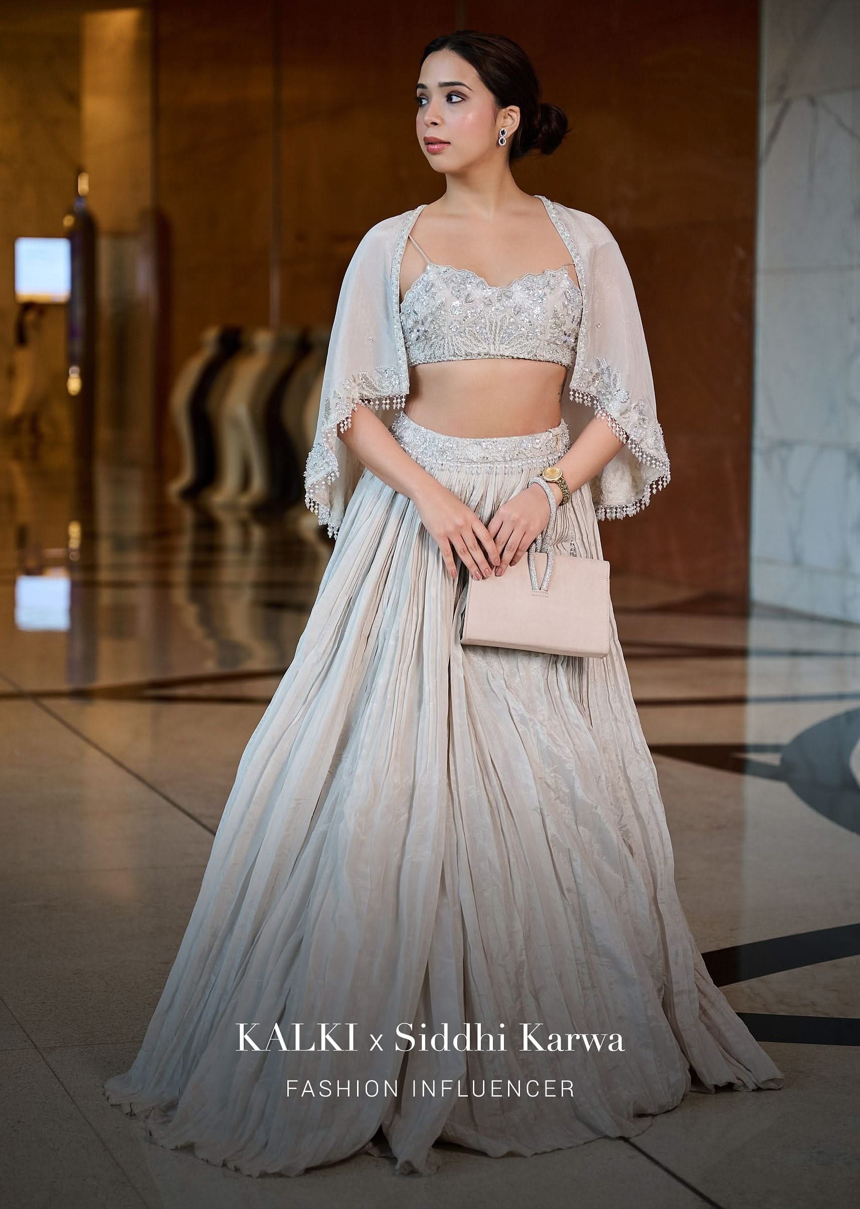 White Ruched Lehenga With Spaghetti Blouse And Cape - Image 6
